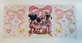 Mickey and friends with bows