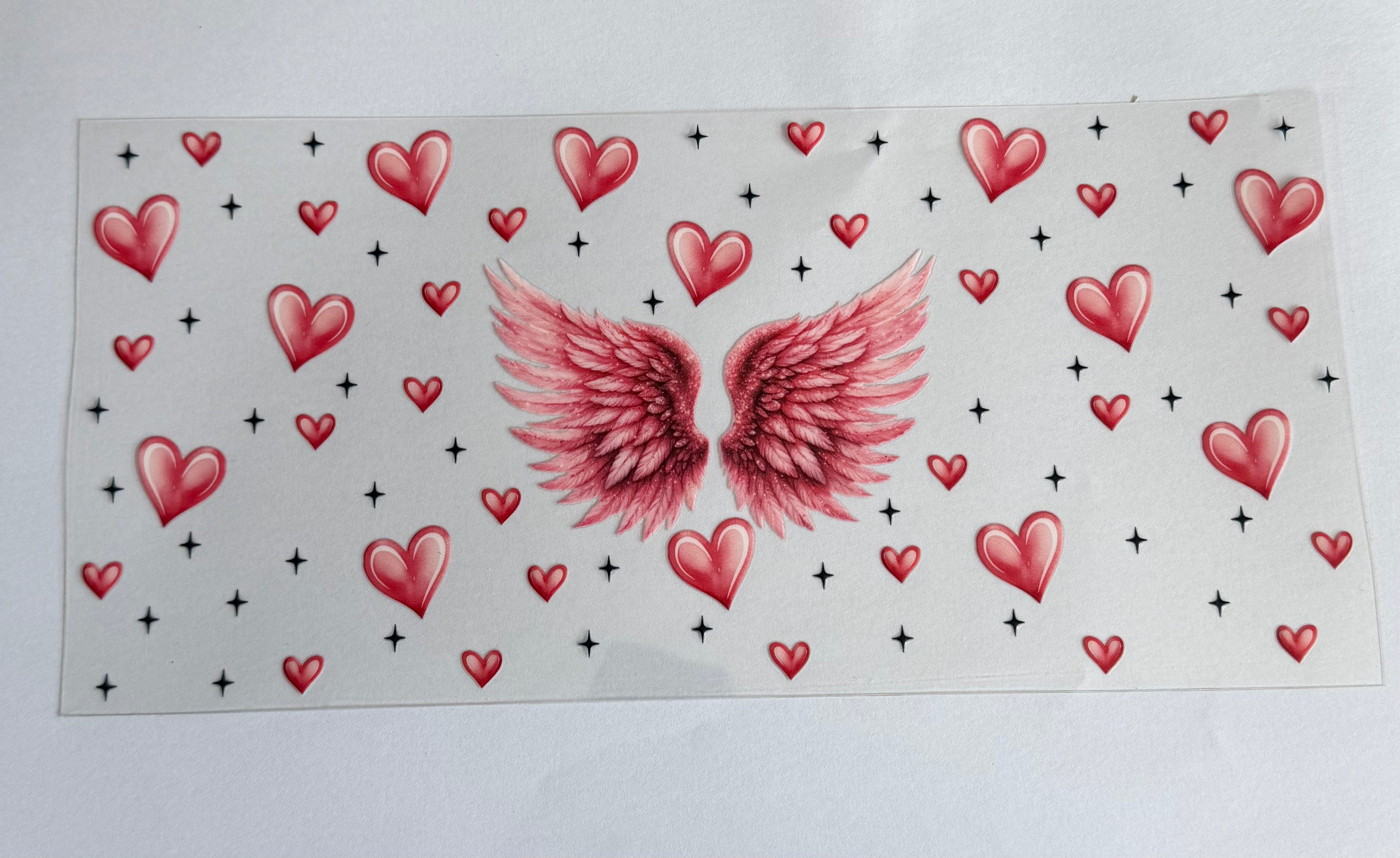 Pink wings and hearts