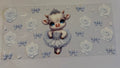 White cow with bow and flowers