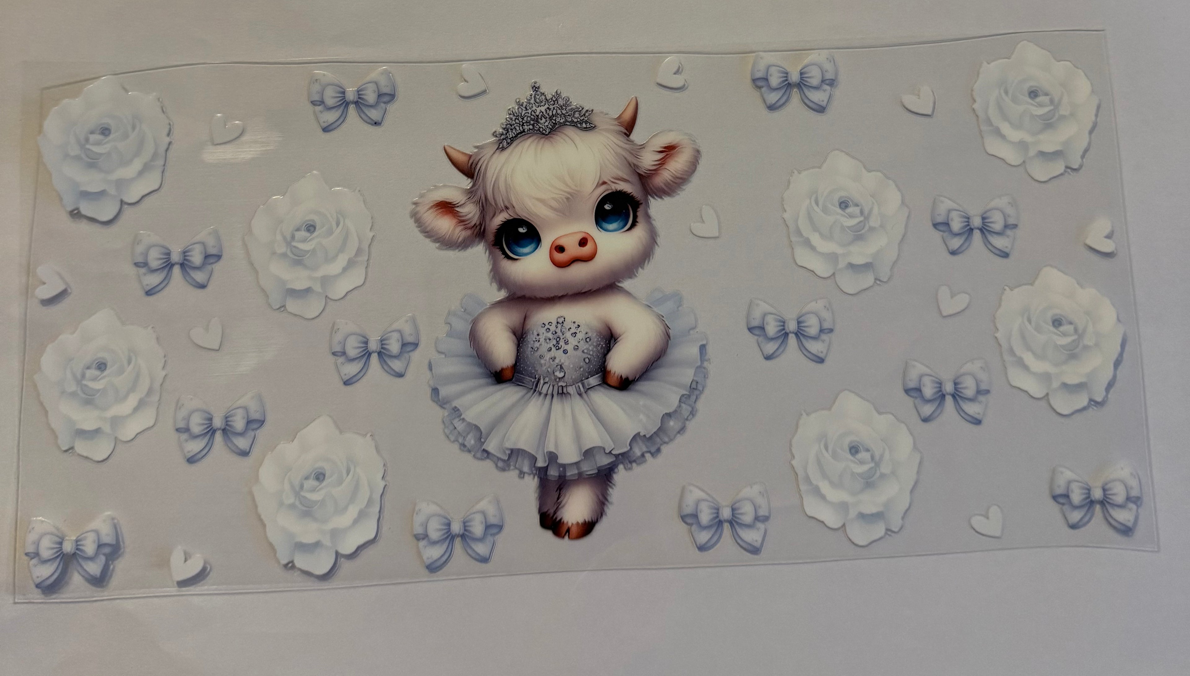 White cow with bow and flowers
