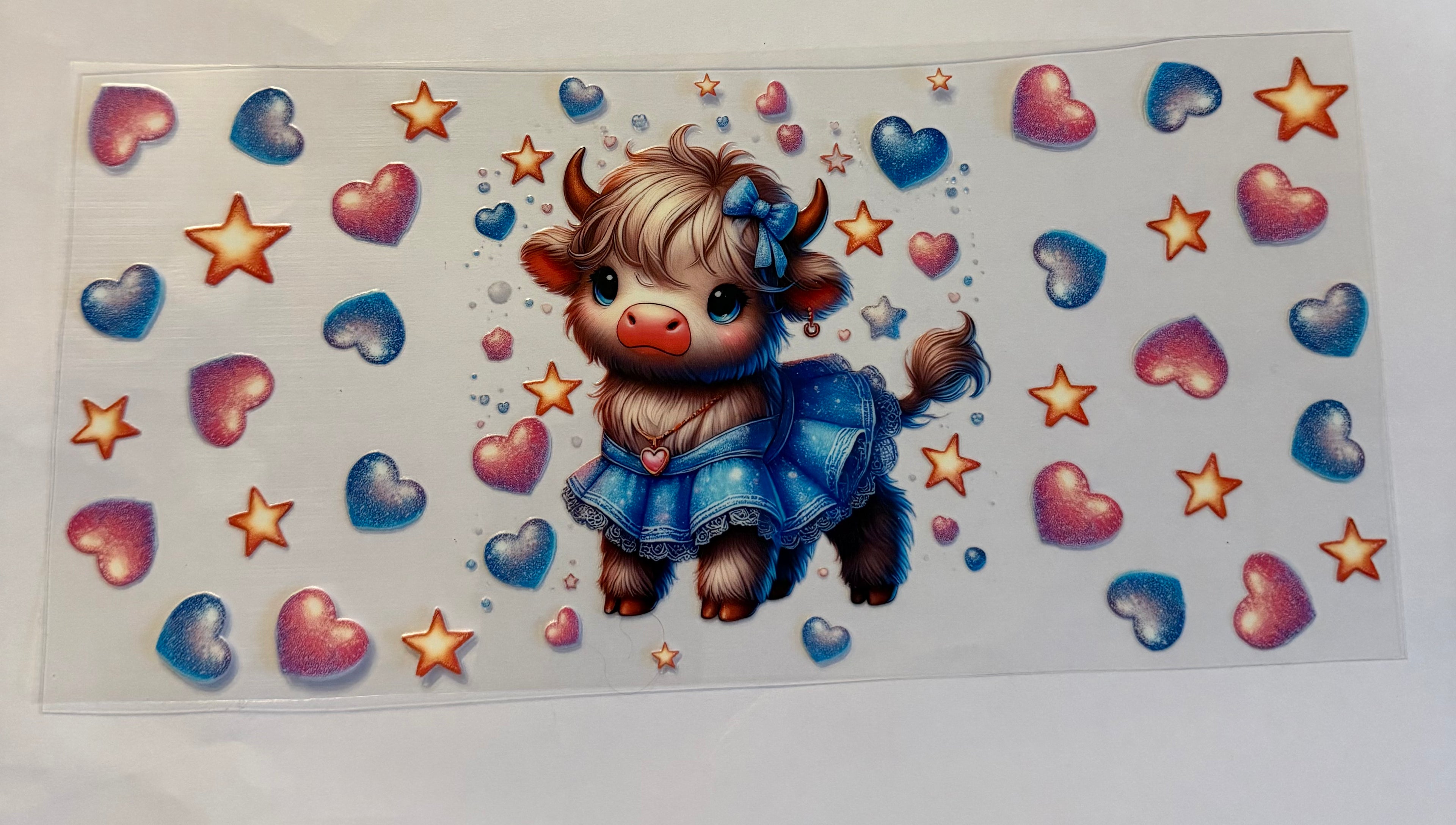 Cow and hearts and stars