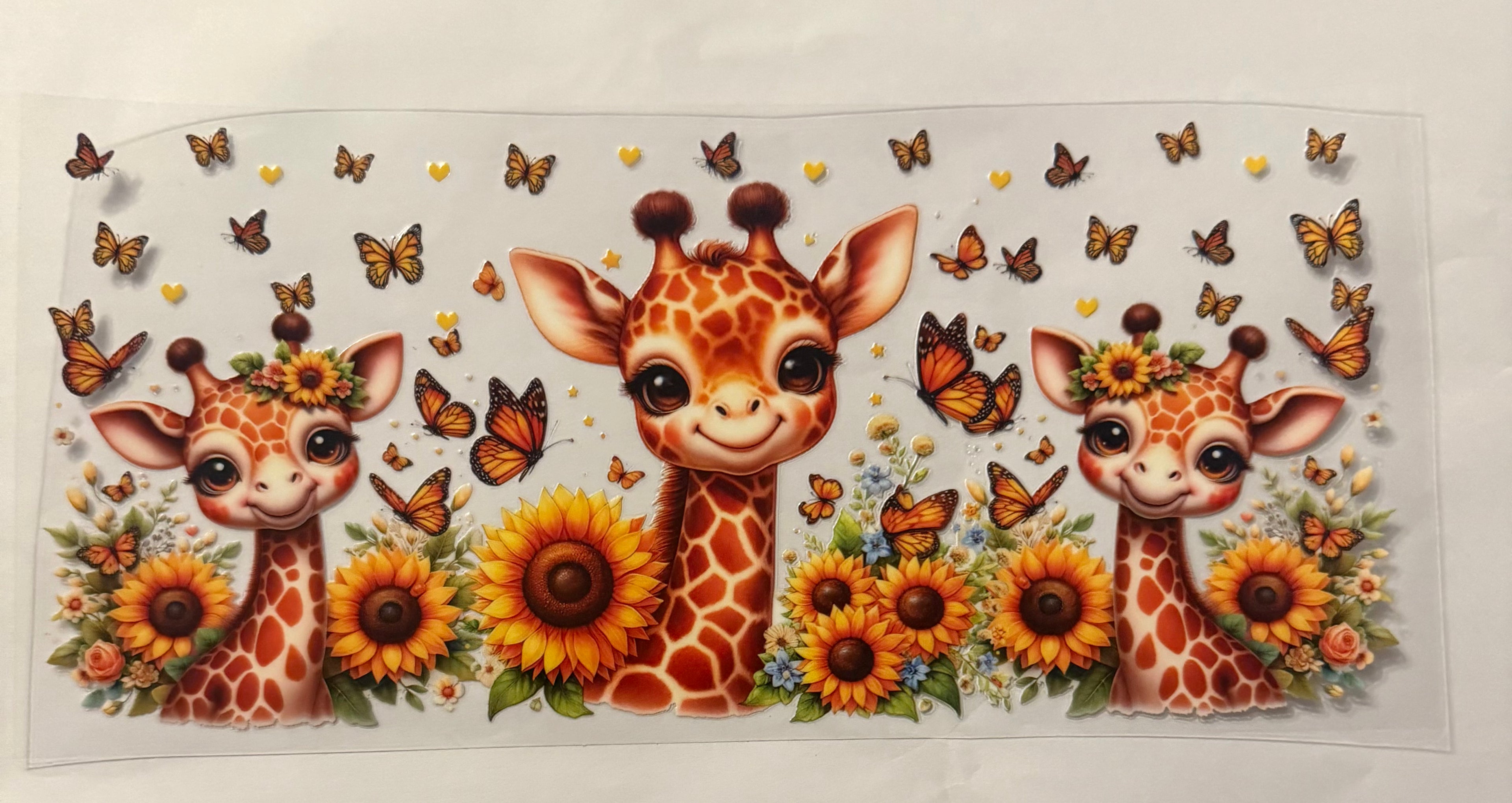 Giraffe with sunflowers