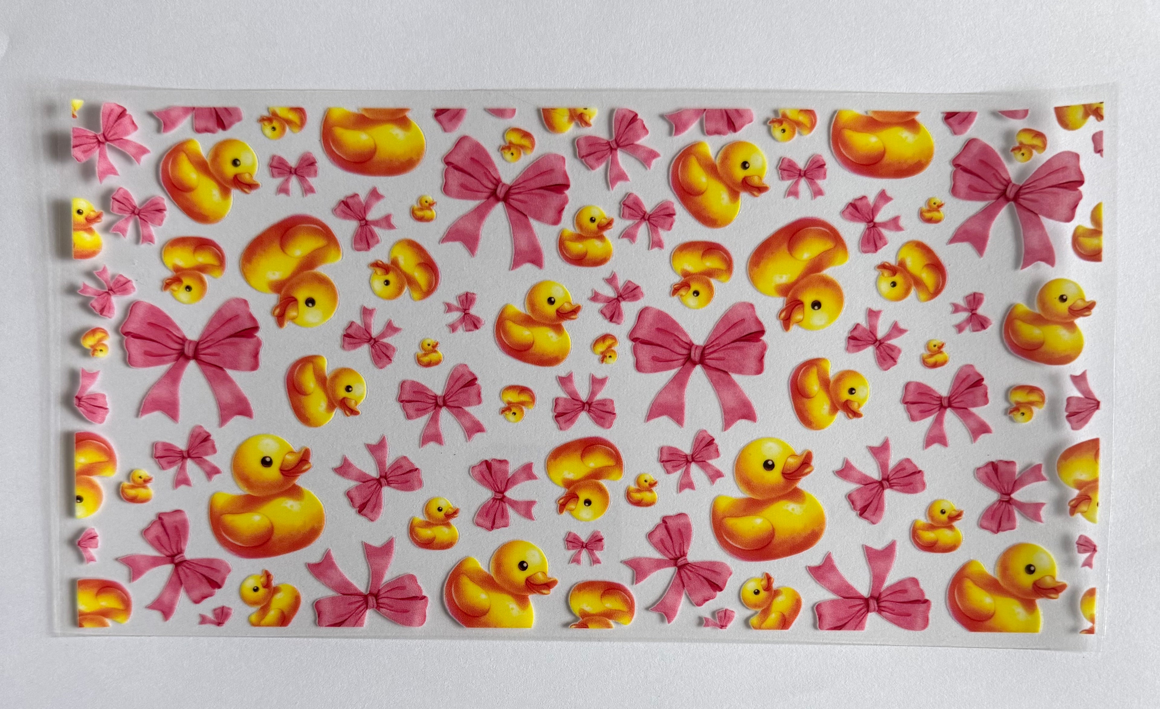 Ducks and pink bows