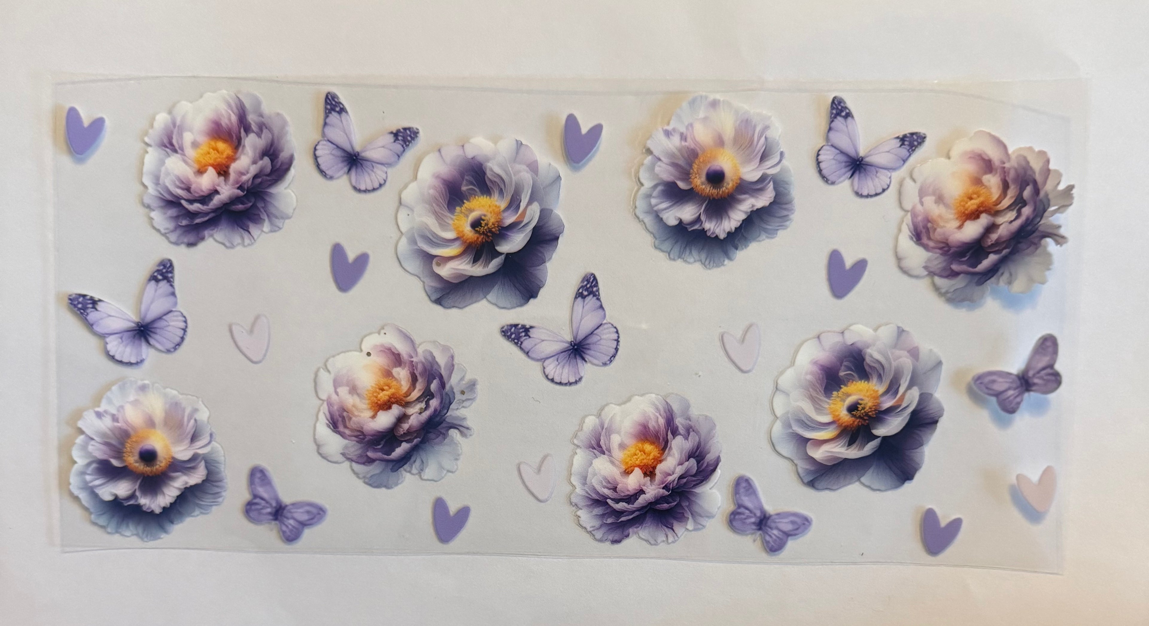 Purple butterfly with flowers and hearts