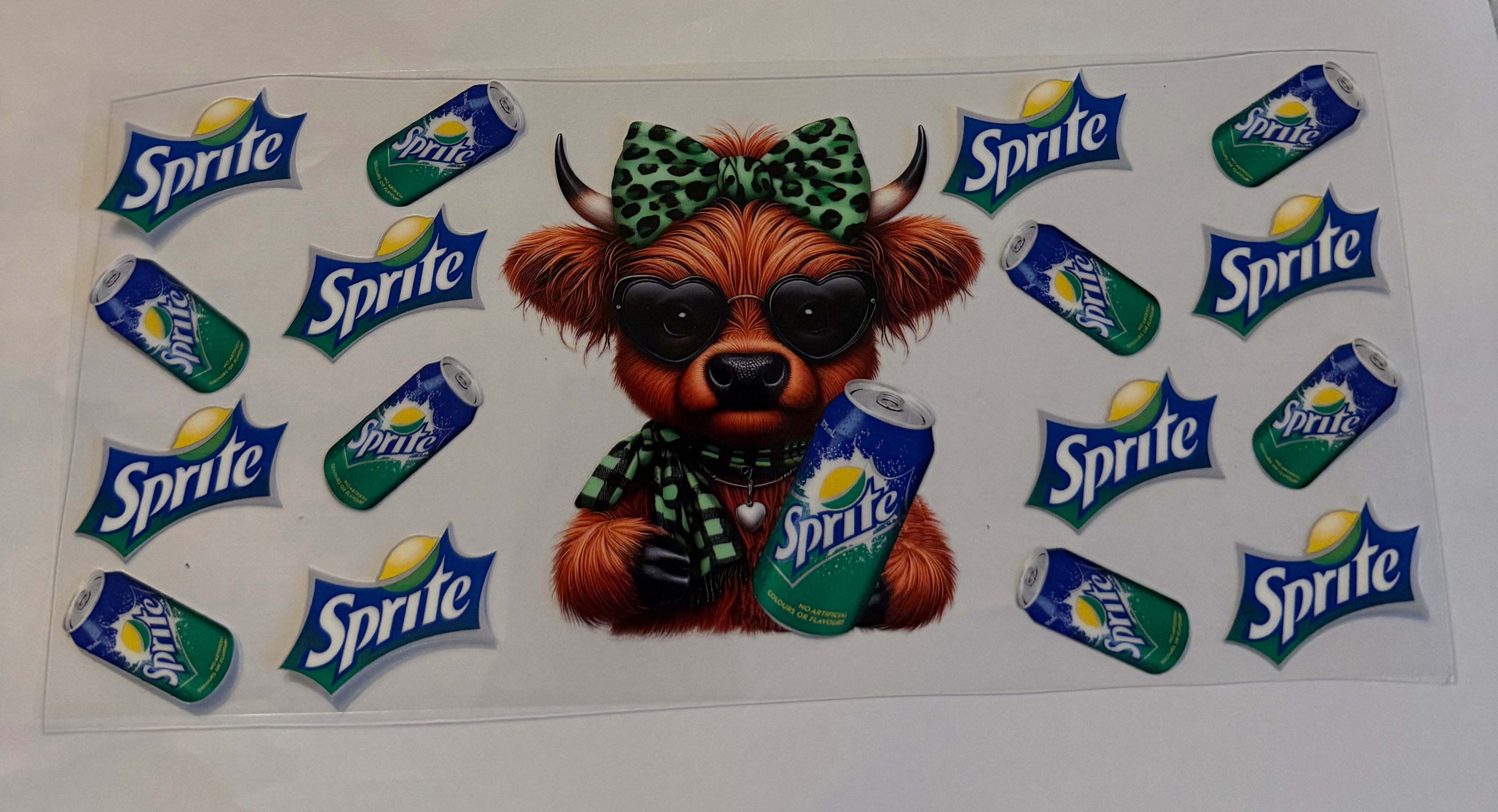 Cow and sprite with green bow