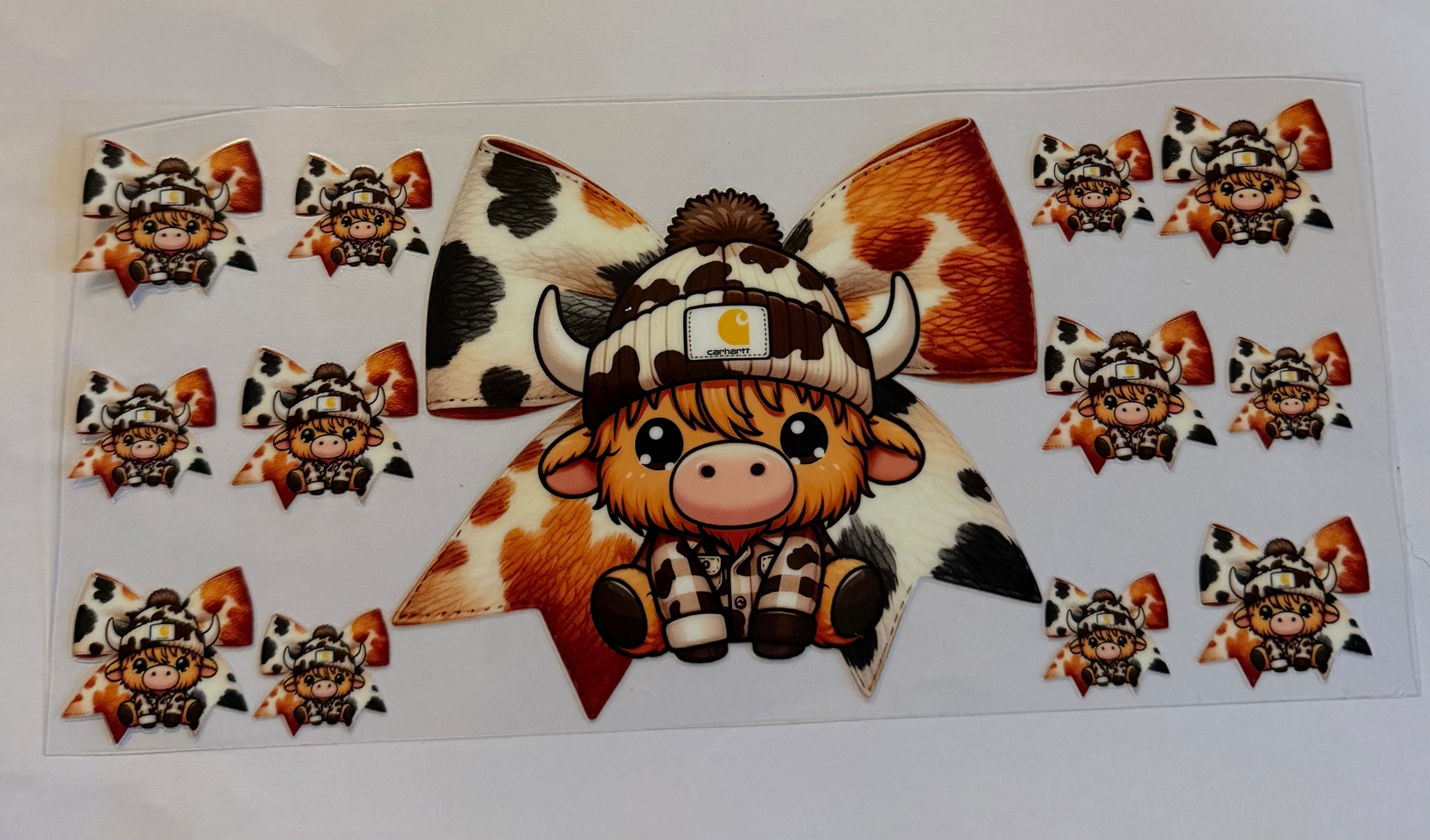 Cow with Carhartt beanie and bow