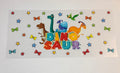 Dinosaur with bows and stars