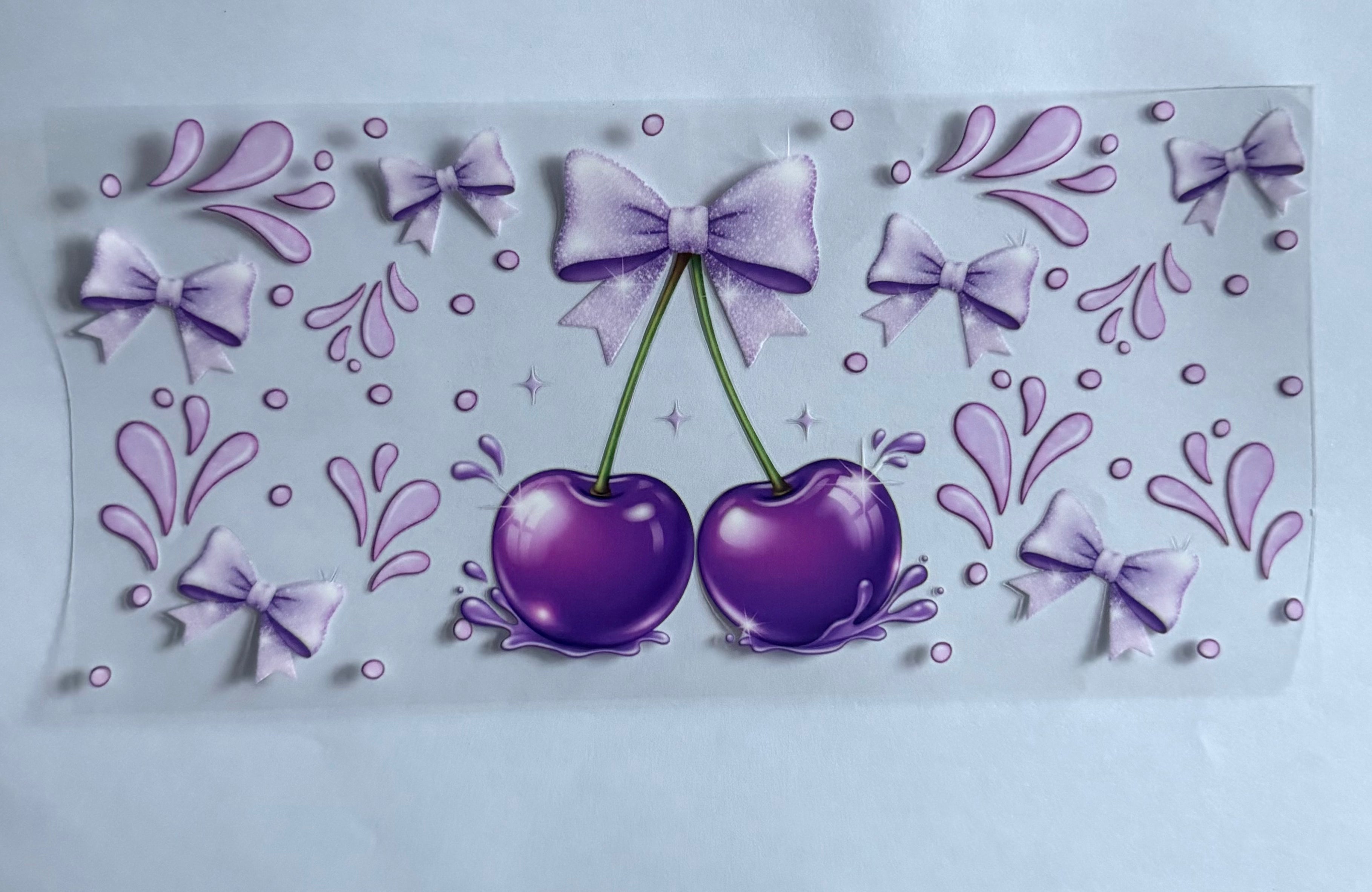 Purple cherries with bows