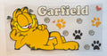 Garfield with paws and flowers