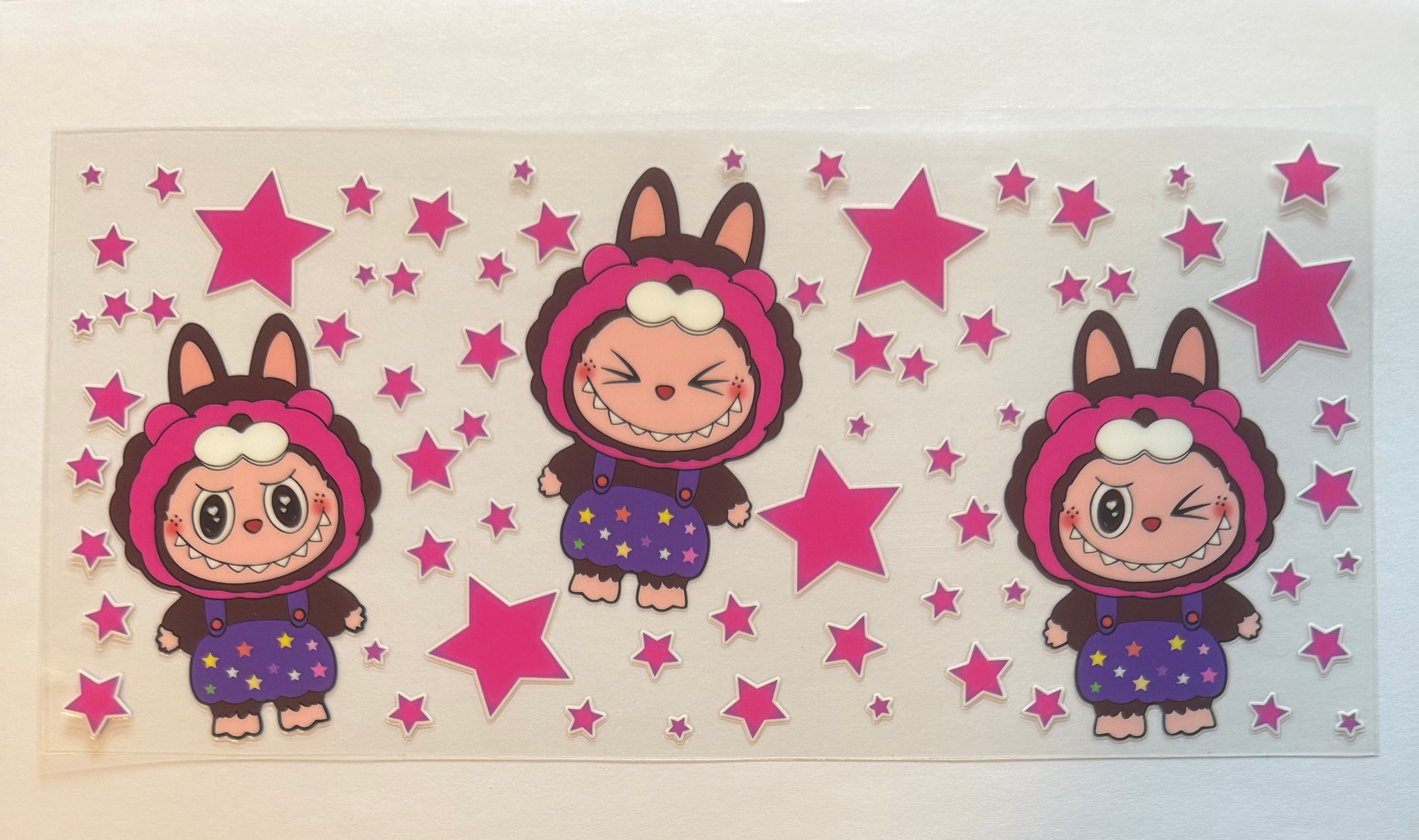 Brown Labubu with pink stars