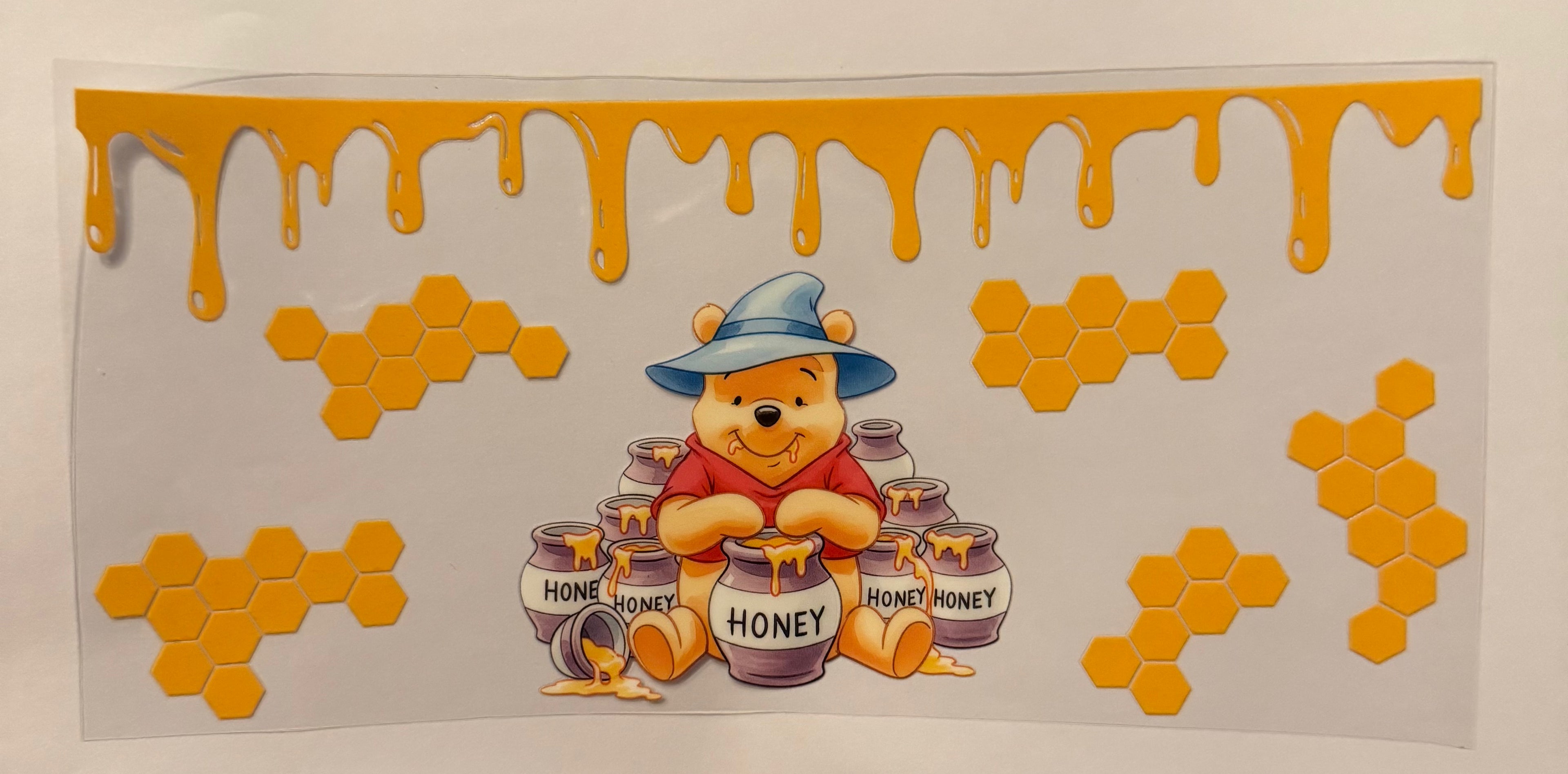 Winnie the Pooh with honey