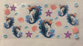 Sea horse with shell and starfish