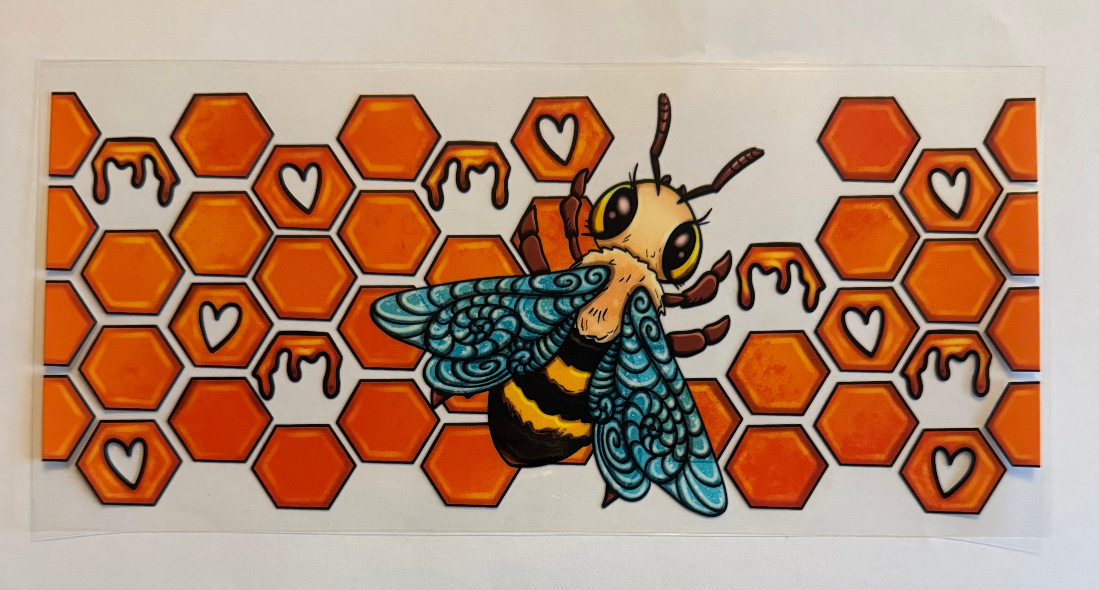 Bee with honeycomb