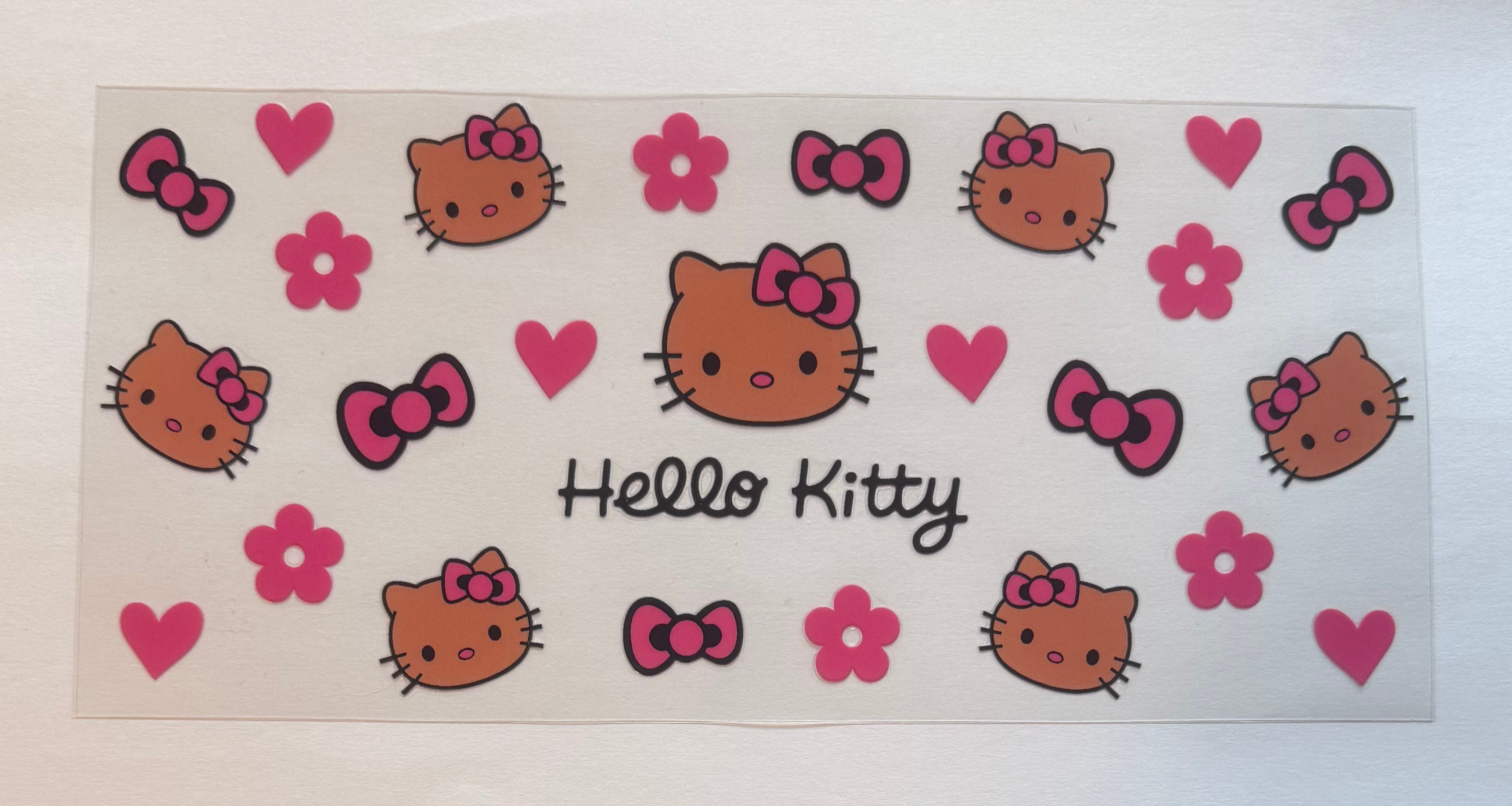 Orange Hello kitty faces and bows
