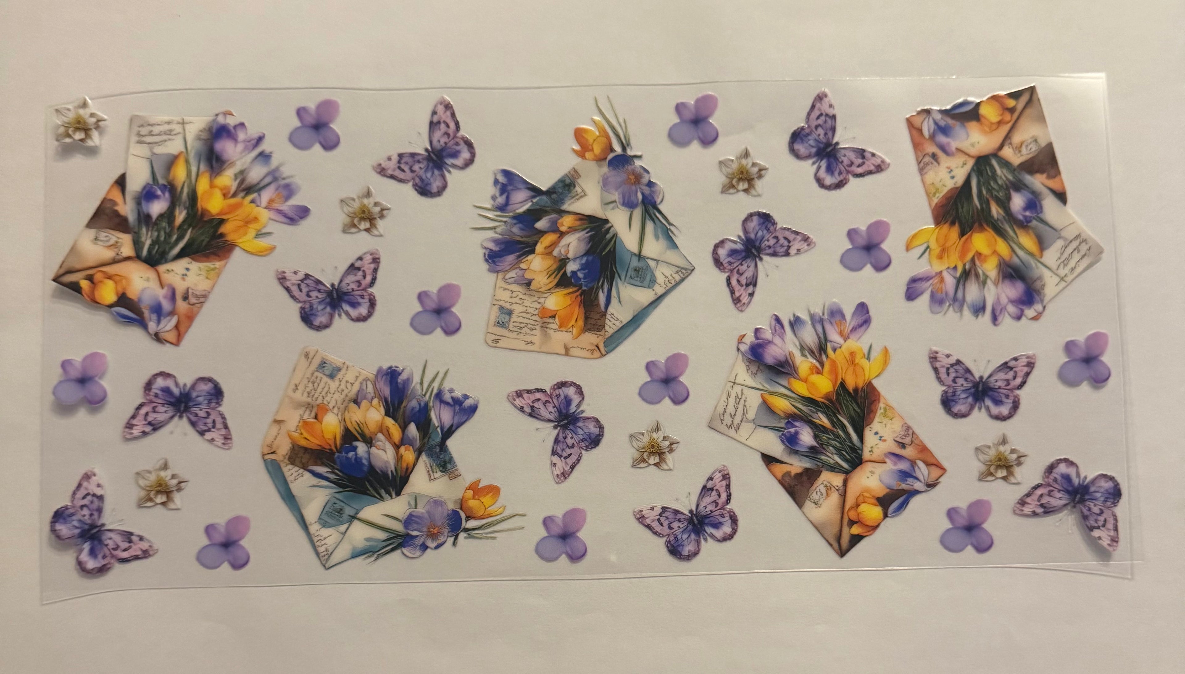 Envelopes with flowers and butterflies