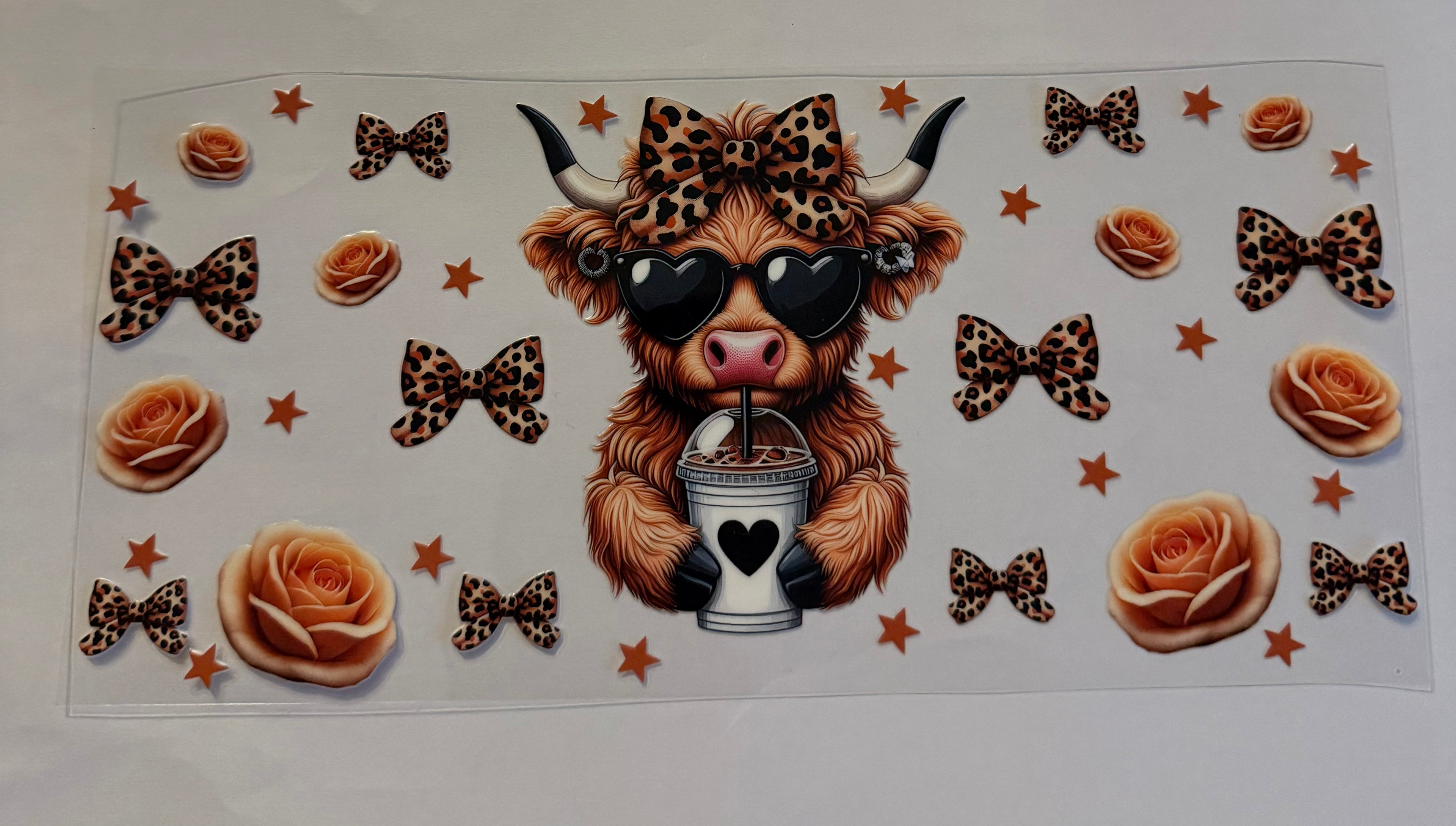 Cow with Cheetah bow and coffee